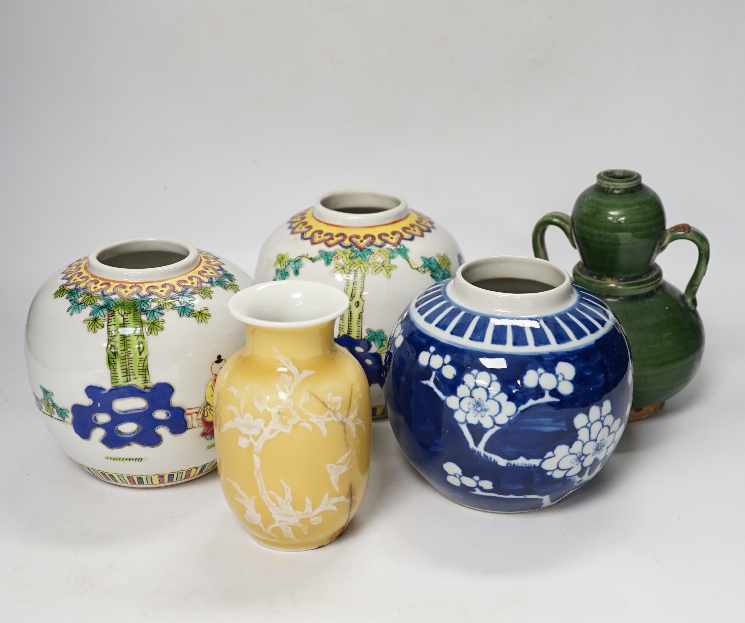 A Chinese blue and white ginger jar, a green two-handled double gourd vase, a pair of vases, and another, tallest 15cm